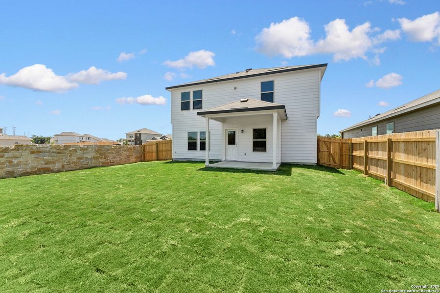 Front exterior of a new home in Cinco Lakes, San Antonio, TX, highlighting curb appeal (Image 2). Front exterior of a new home in Cinco Lakes, San Antonio, TX, highlighting curb appeal (Image 2).