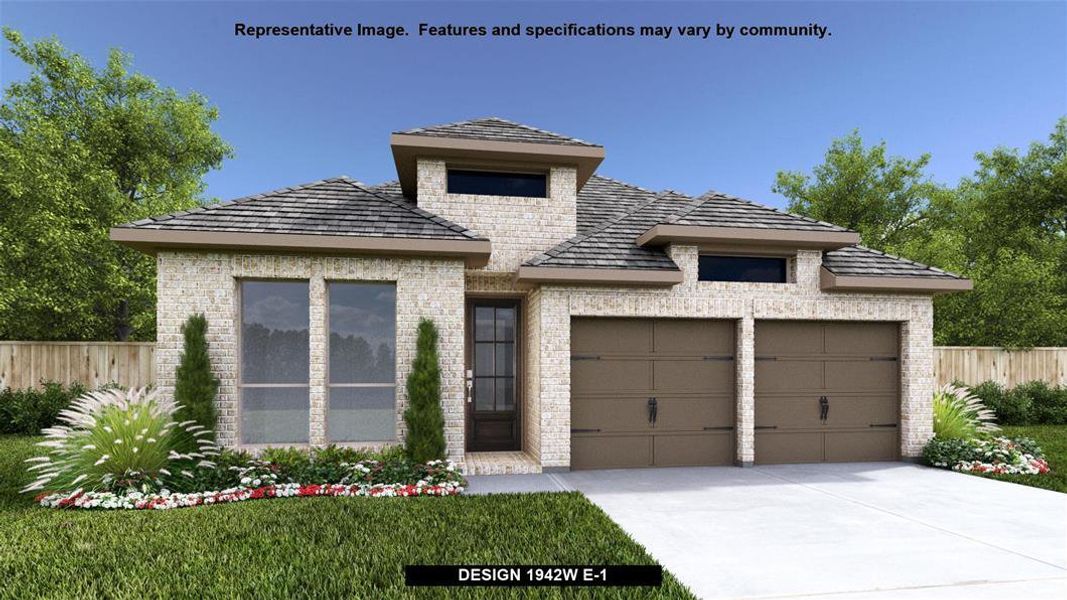 View of front facade with brick siding, fence, driveway, and an attached garage