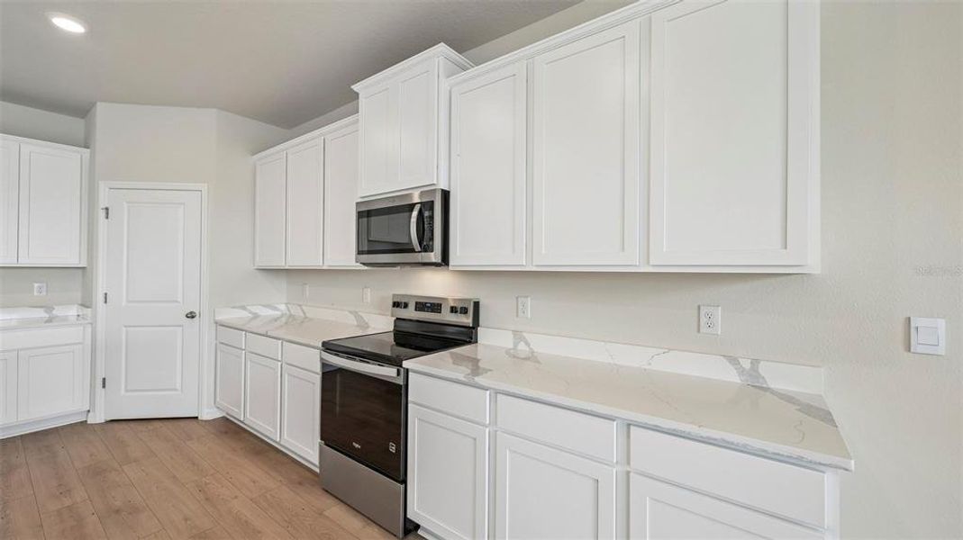 Furnished interior view inside a new home in Oakfield Trails, Parrish (Image 11).