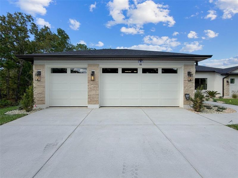 Front exterior of a new home in , Homosassa, FL, highlighting curb appeal (Image 2). Front exterior of a new home in , Homosassa, FL, highlighting curb appeal (Image 2).
