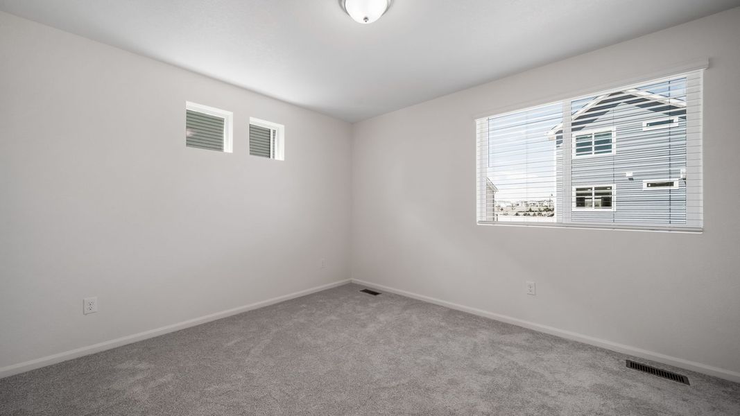 Spacious, unfurnished interior of a new home in Banning Lewis Ranch, Colorado Springs (Image 22).
