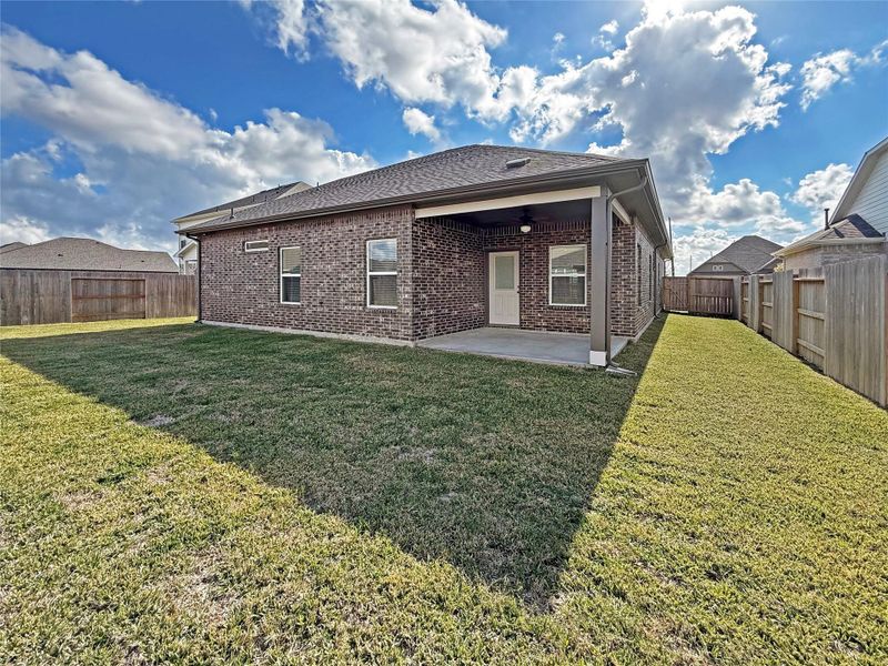 Exterior details and patio area of a home in Sierra Vista, Iowa Colony (Image 4).