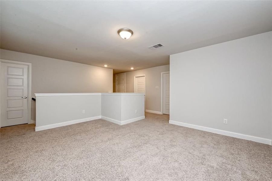 Representative unfurnished interior of a home built from the Plan 2500 by Adams Homes in The Bluffs at Lafayette, Freeport (Image 33).