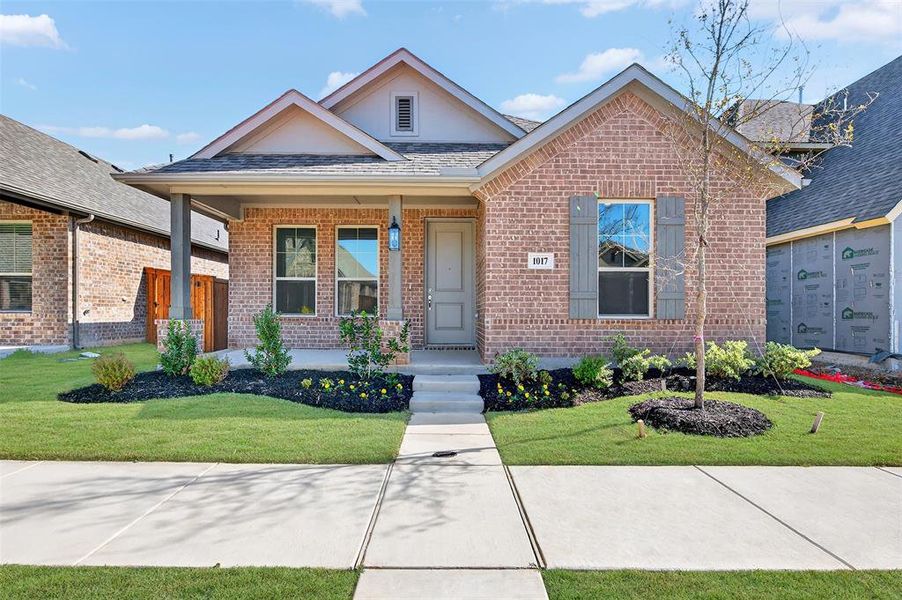 Front exterior of a new home in Tarrytown, Crowley, TX, highlighting curb appeal (Image 1).