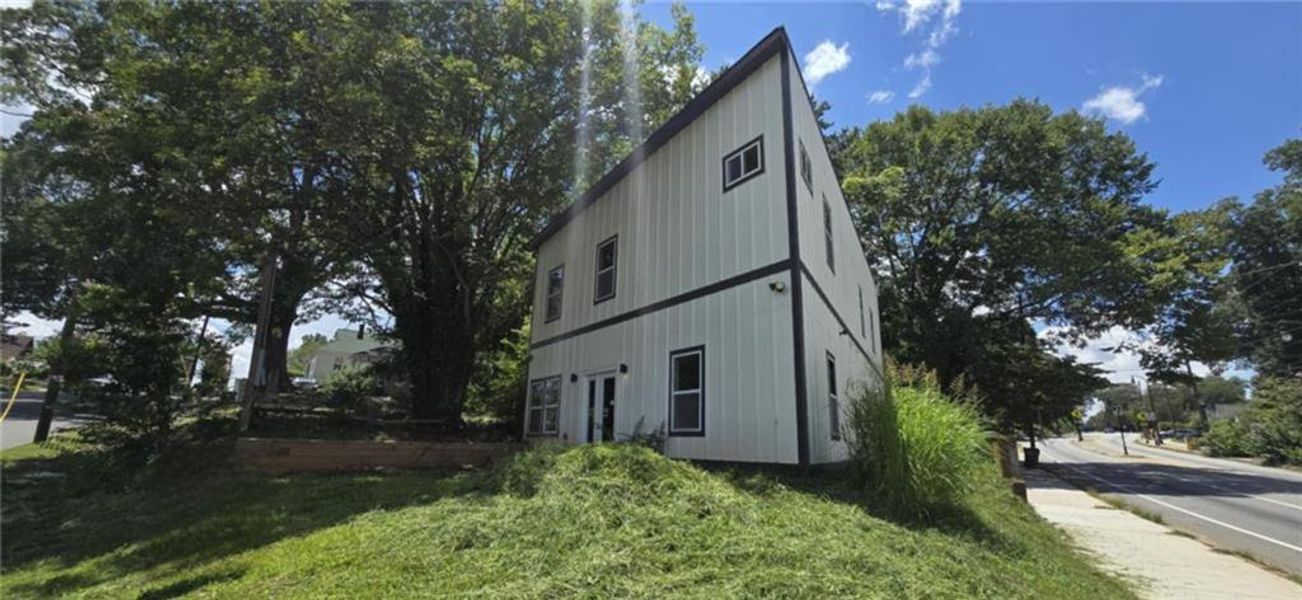 Front exterior of a new home in , Atlanta, GA, highlighting curb appeal (Image 23).