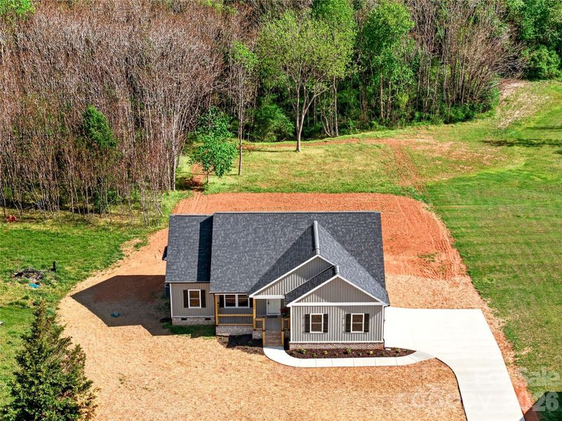 Front exterior of a new home in , Harmony, NC, highlighting curb appeal (Image 25). Front exterior of a new home in , Harmony, NC, highlighting curb appeal (Image 25).