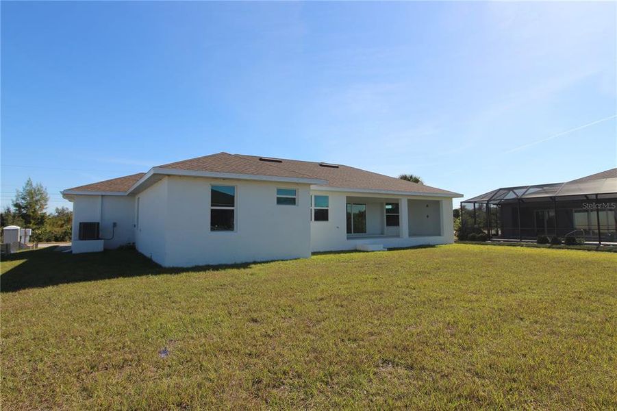 Exterior details and patio area of a home in , Port Charlotte (Image 14).