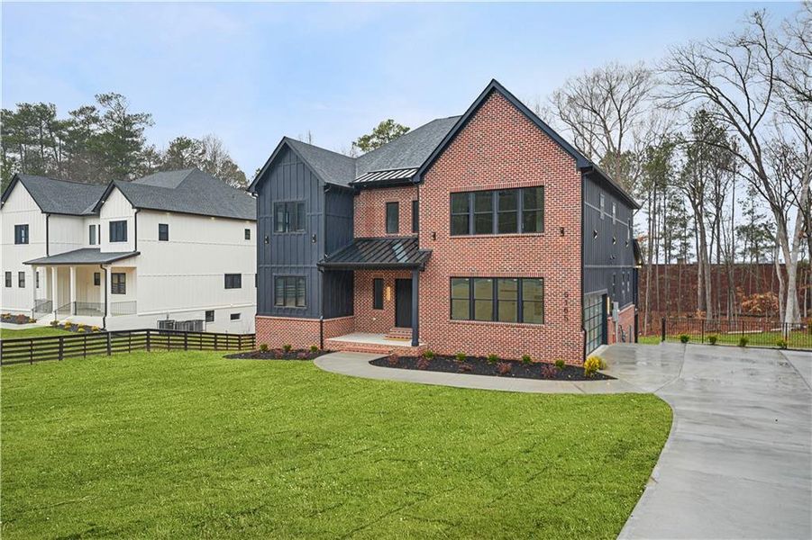 Front exterior of a new home in , Atlanta, GA, highlighting curb appeal (Image 1). Front exterior of a new home in , Atlanta, GA, highlighting curb appeal (Image 1).