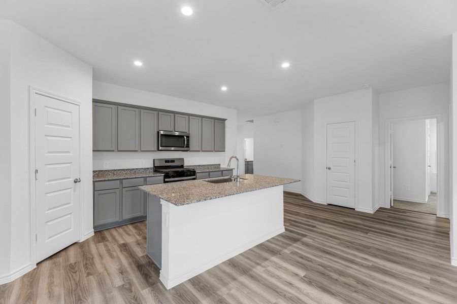 Furnished interior view inside a new home in Reserve at Mallard Lakes, Orange (Image 8). Furnished interior view inside a new home in Reserve at Mallard Lakes, Orange (Image 8).