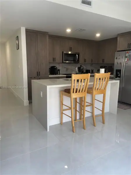 Furnished interior view inside a new home in , Florida City (Image 43).