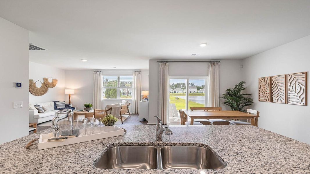 Furnished interior view inside a new home in Pine Hills at Cane Bay, Summerville (Image 19). Furnished interior view inside a new home in Pine Hills at Cane Bay, Summerville (Image 19).