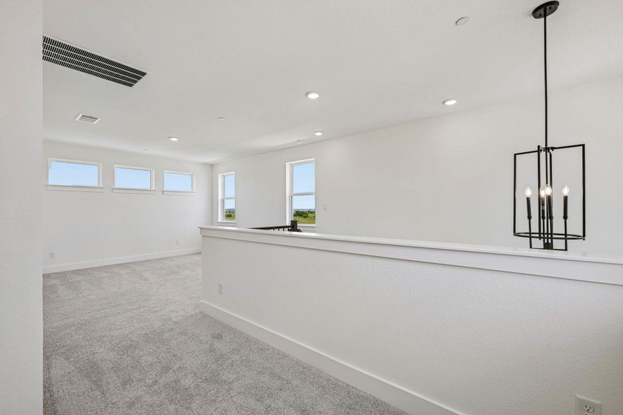 Spacious, unfurnished interior of a new home in Avery Centre, Round Rock (Image 23).