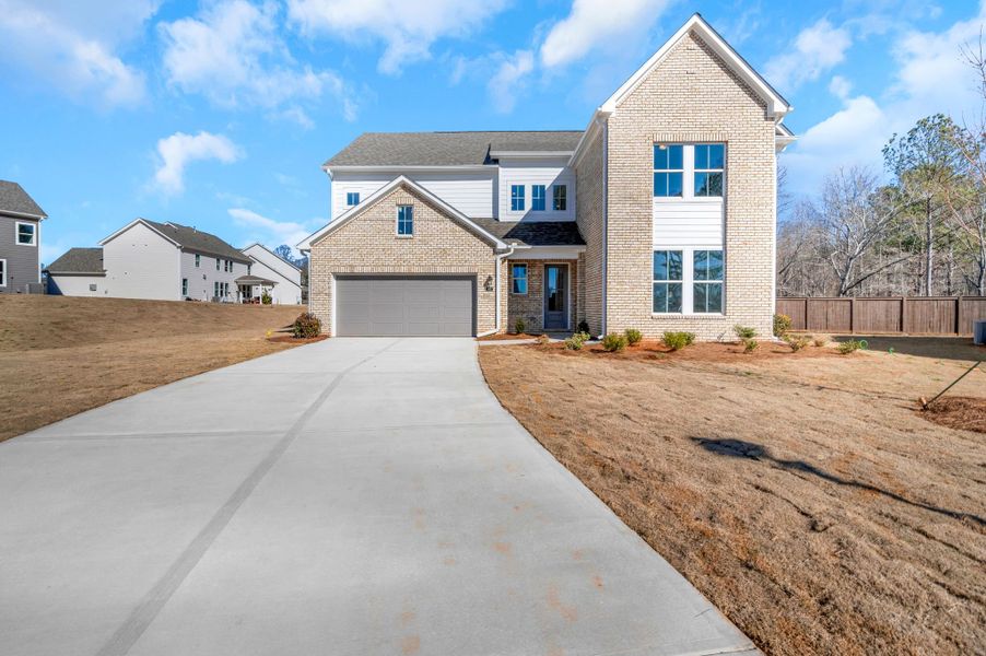 Representative exterior photo of a completed home built from the The Madison by UnionMain Homes in Pickens Bluff, Hiram, GA (Image 17). Representative exterior photo of a completed home built from the The Madison by UnionMain Homes in Pickens Bluff, Hiram, GA (Image 17).