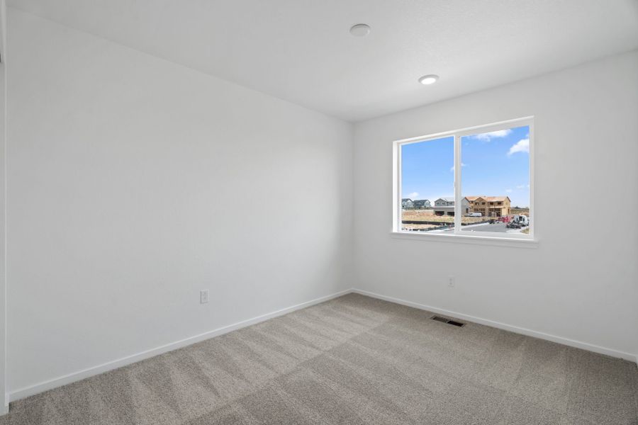Spacious, unfurnished interior of a new home in Sky Ranch, Watkins (Image 19).