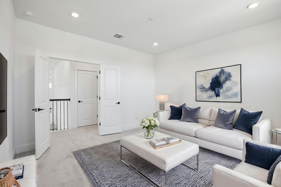 Representative furnished interior of a home built from the Anderson by Taylor Morrison in Travisso, Leander (Image 11).