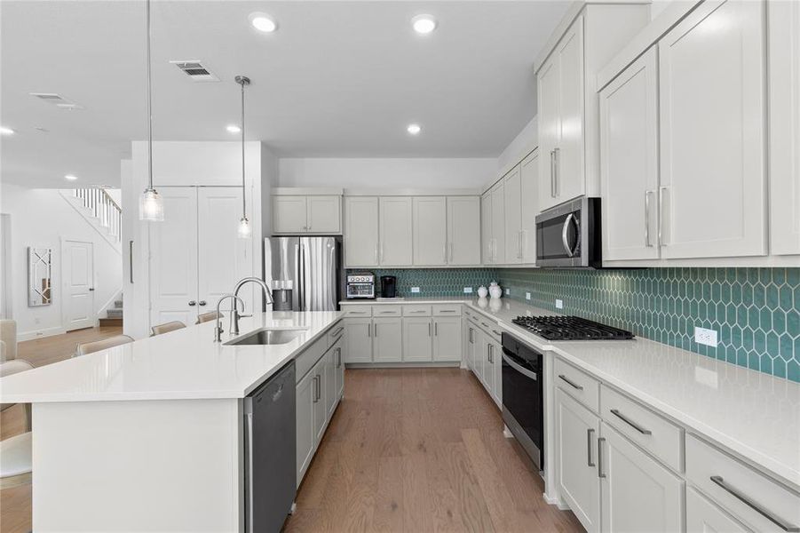 Furnished interior view inside a new home in North Square at Uptown, Celina (Image 31).