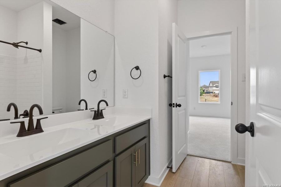 Furnished interior view inside a new home in Hennersby Hollow, San Antonio (Image 9).