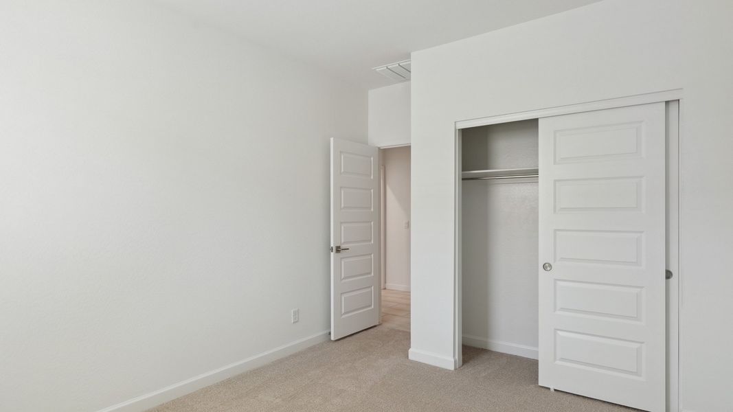 Representative unfurnished interior of a home built from the Cobalt by D.R. Horton in Zanjero Pass, Glendale (Image 20).