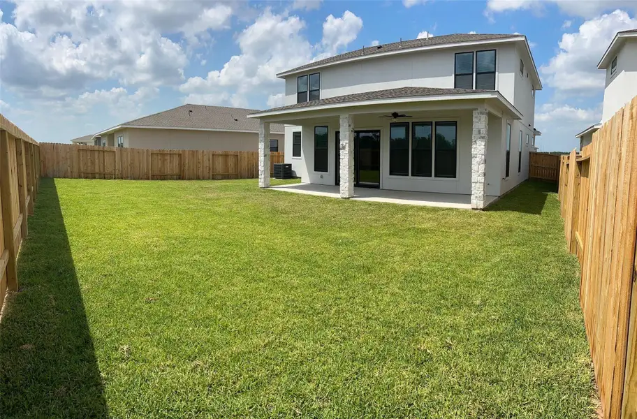 Exterior details and patio area of a home in Hallimore Ranch, Rosenberg (Image 1).