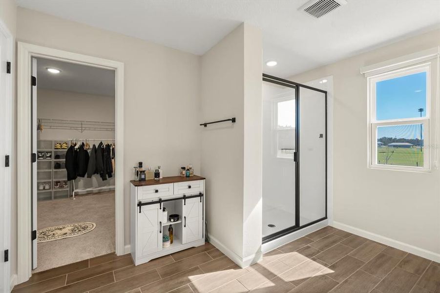 Furnished interior view inside a new home in Seasons at Lakeside Forest, Tavares (Image 27).