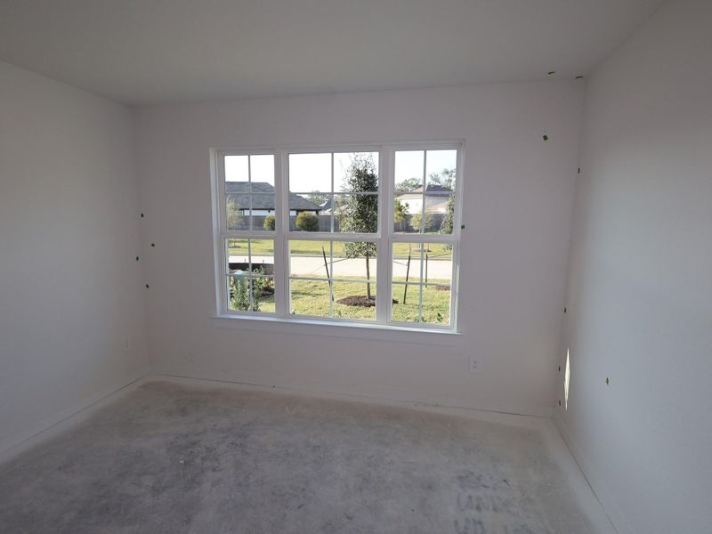 Spacious, unfurnished interior of a new home in Pinewood at Grand Texas, New Caney (Image 10).