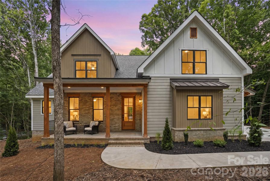 Front exterior of a new home in , Monroe, NC, highlighting curb appeal (Image 23).