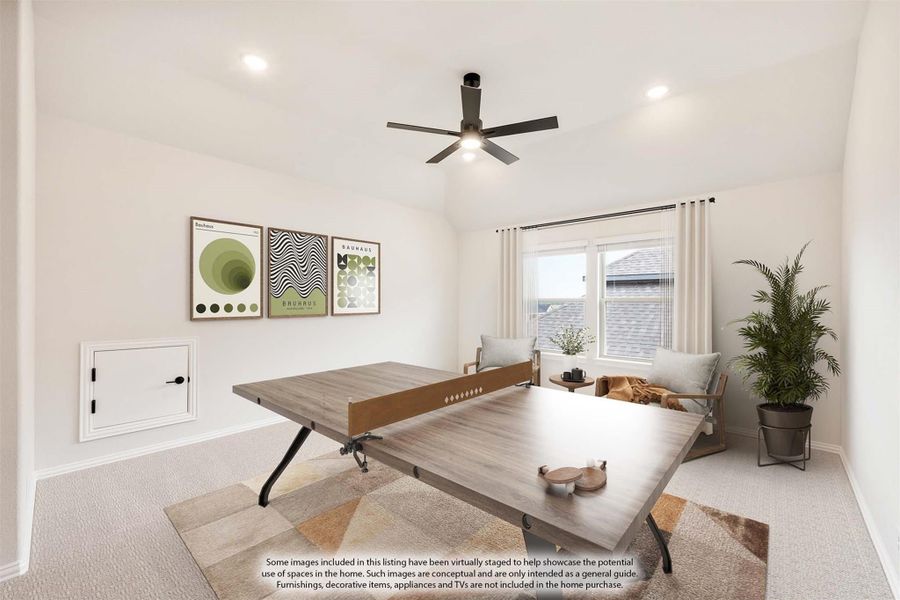 Game room with ping pong table, ceiling fan, vaulted ceiling, and carpet flooring