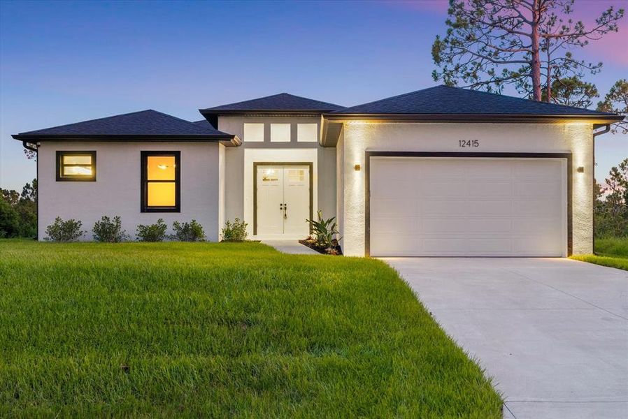 Front exterior of a new home in , Port Charlotte, FL, highlighting curb appeal (Image 2). Front exterior of a new home in , Port Charlotte, FL, highlighting curb appeal (Image 2).