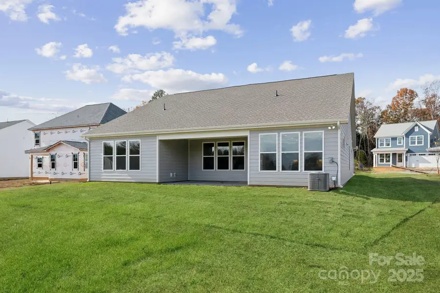 Exterior details and patio area of a home in Oakridge Farms, Mooresville (Image 3).