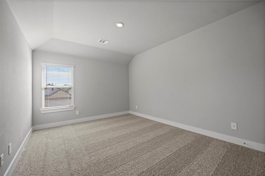 Spacious secondary bedrooms with plush carpet and ample closet space.