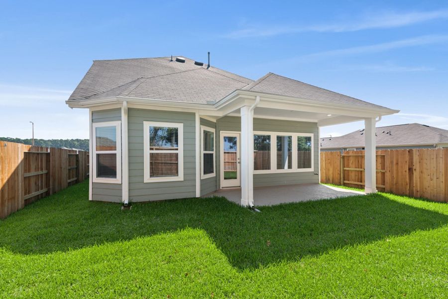 Front exterior of a new home in Lone Star Landing, Montgomery, TX, highlighting curb appeal (Image 1). Front exterior of a new home in Lone Star Landing, Montgomery, TX, highlighting curb appeal (Image 1).