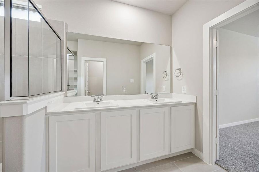 Primary Bathroom in the Willow home plan by Trophy Signature Homes – REPRESENTATIVE PHOTO