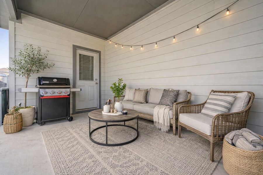 View of patio / terrace with a grill and outdoor seating