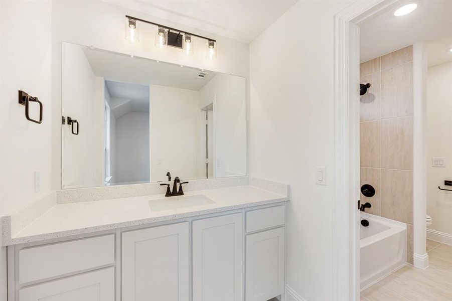 Furnished interior view inside a new home in Windsong Ranch Classic 61, Prosper (Image 13).