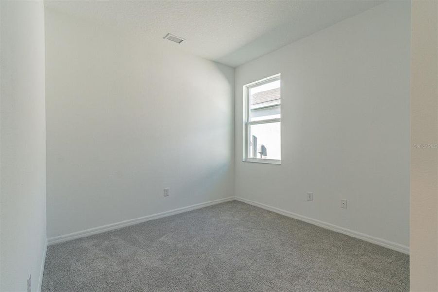 Spacious, unfurnished interior of a new home in The Hammocks at West Port, Port Charlotte (Image 9). Spacious, unfurnished interior of a new home in The Hammocks at West Port, Port Charlotte (Image 9).