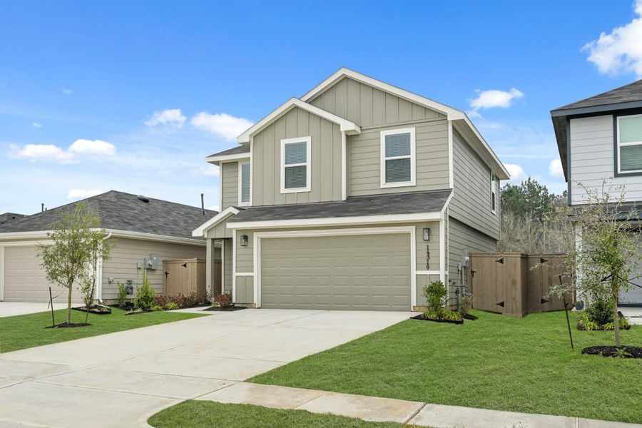 Front exterior of a new home in The Canopies, Splendora, TX, highlighting curb appeal (Image 16).