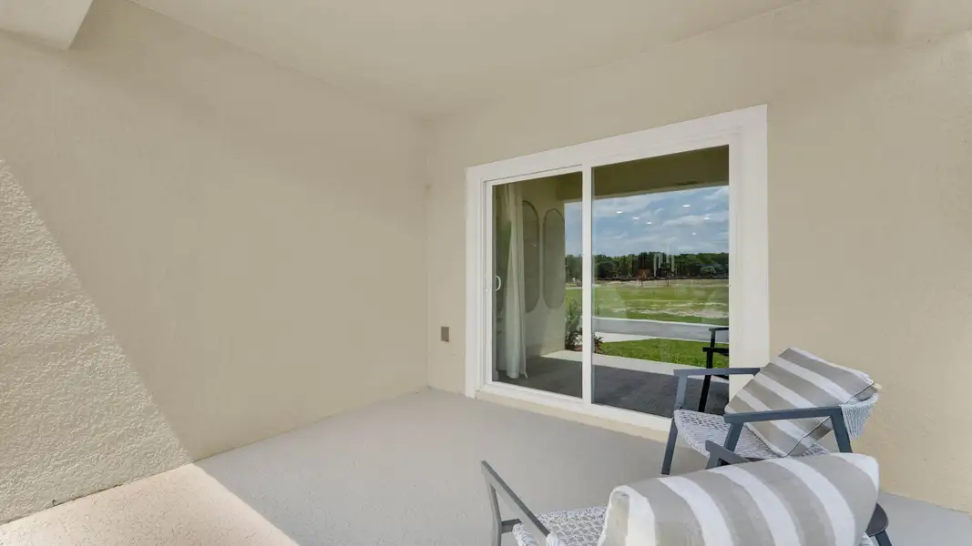 Exterior details and patio area of a home in Crossroads at Kelly Park, Apopka (Image 3).