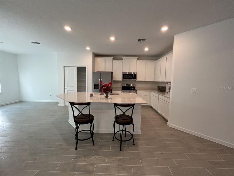 Furnished interior view inside a new home in Grand Park North, Dunnellon (Image 9).