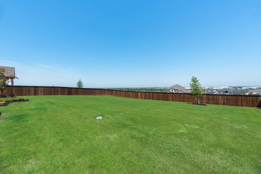 Exterior details and patio area of a home in Sweetgrass, Haslet (Image 3).