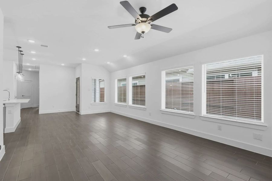 Representative unfurnished interior of a home built from the Carriagehouse by Chesmar Homes in Meridiana Townhomes, Iowa Colony (Image 98).