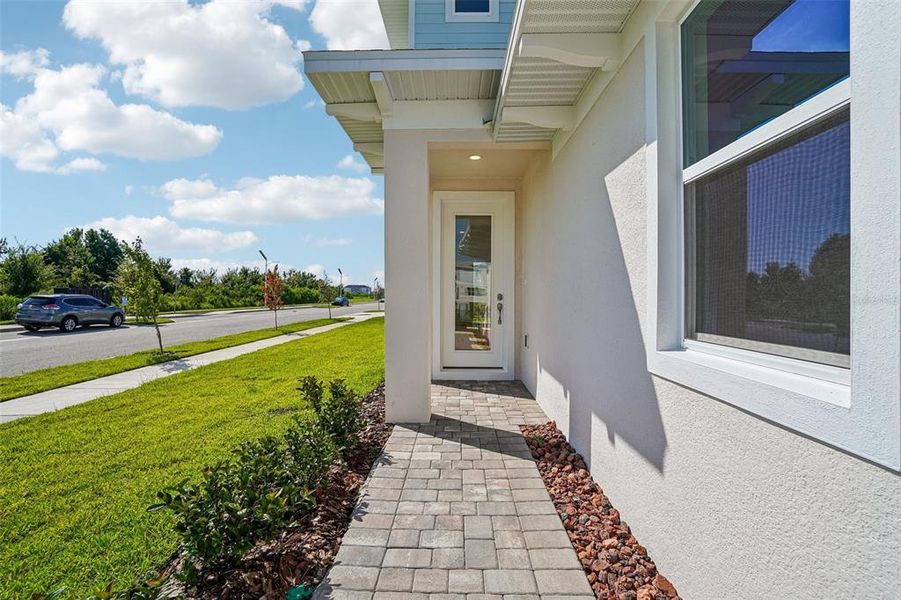 Exterior details and patio area of a home in Lagoon Residences at Epperson, Wesley Chapel (Image 23).