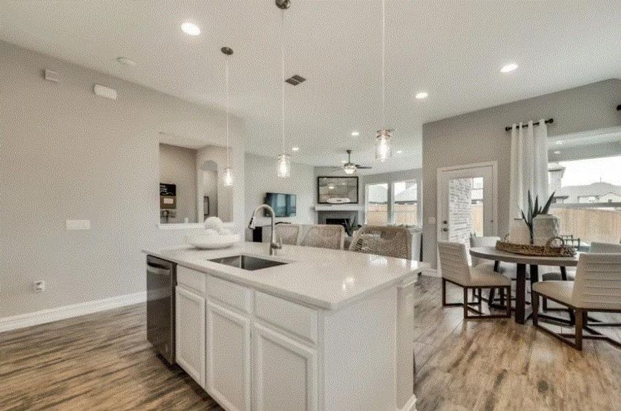 Photo of Pulte model home with same floor plan, not of actual home listed.