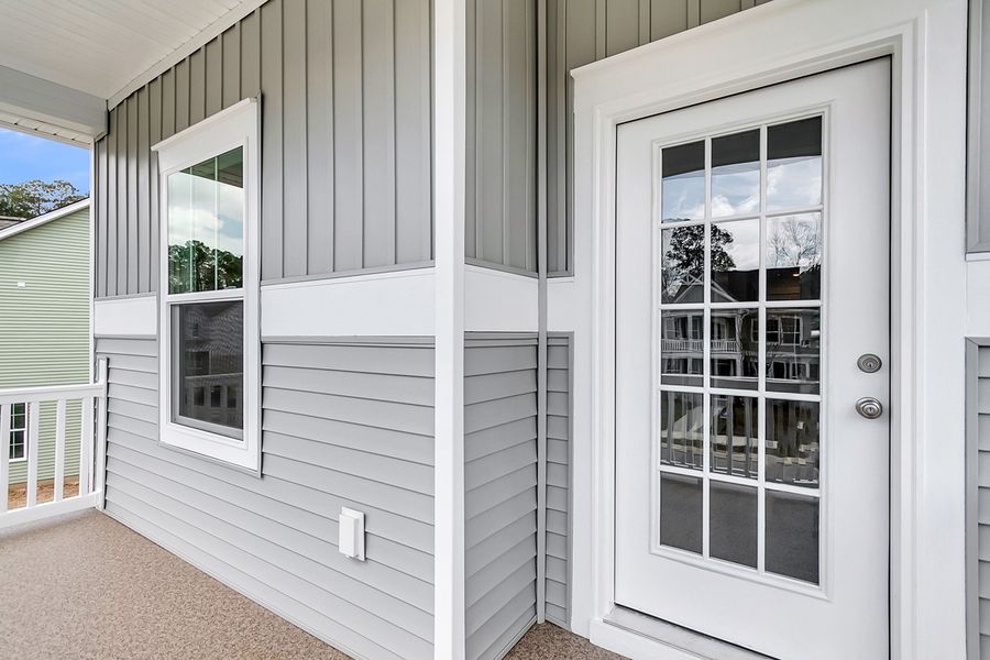 Exterior details and patio area of a home in Six Oaks, Summerville (Image 4).
