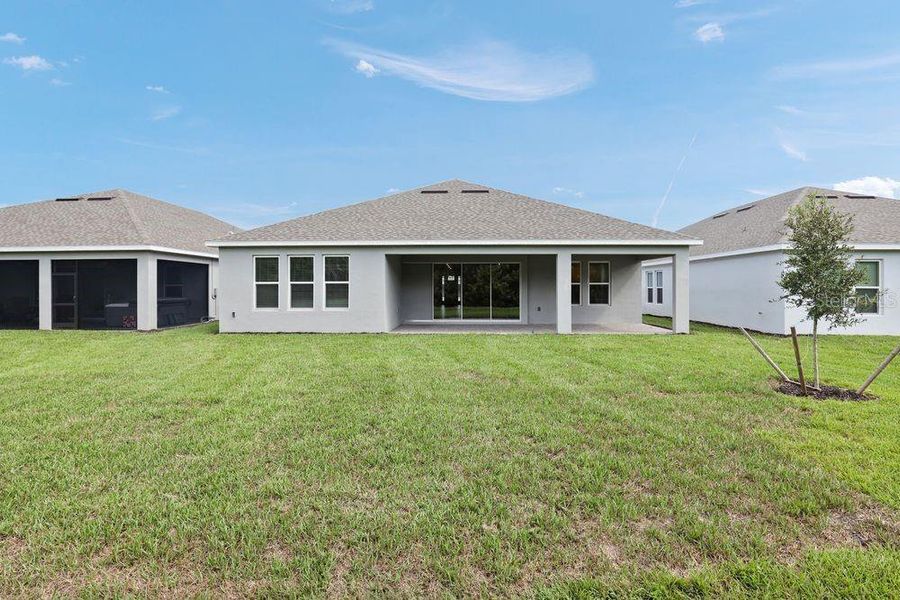 Exterior details and patio area of a home in The Cove at West Port, Port Charlotte (Image 4). Exterior details and patio area of a home in The Cove at West Port, Port Charlotte (Image 4).