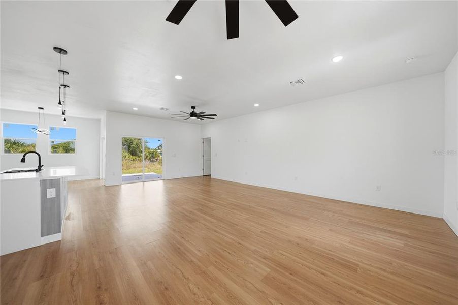 Spacious, unfurnished interior of a new home in , Port Charlotte (Image 26).