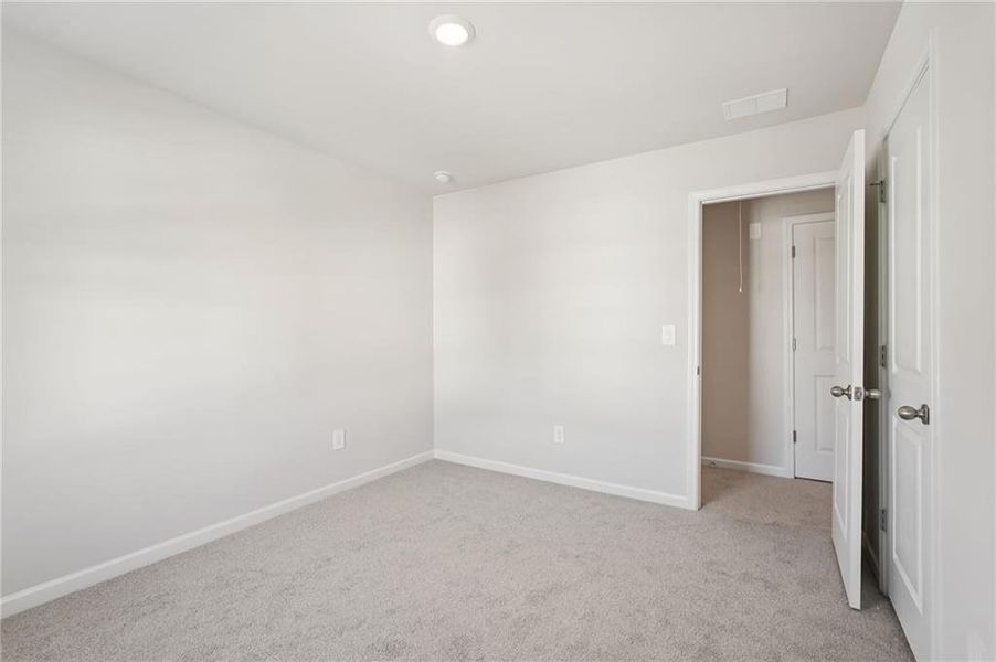 Spacious, unfurnished interior of a new home in Hawthorne Station, College Park (Image 45).