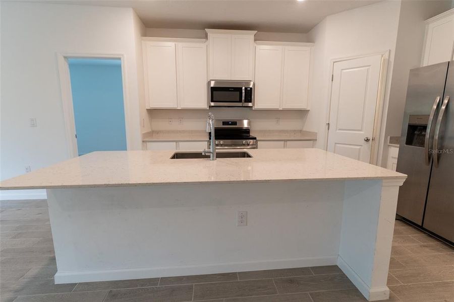 Furnished interior view inside a new home in , Ocala (Image 8).