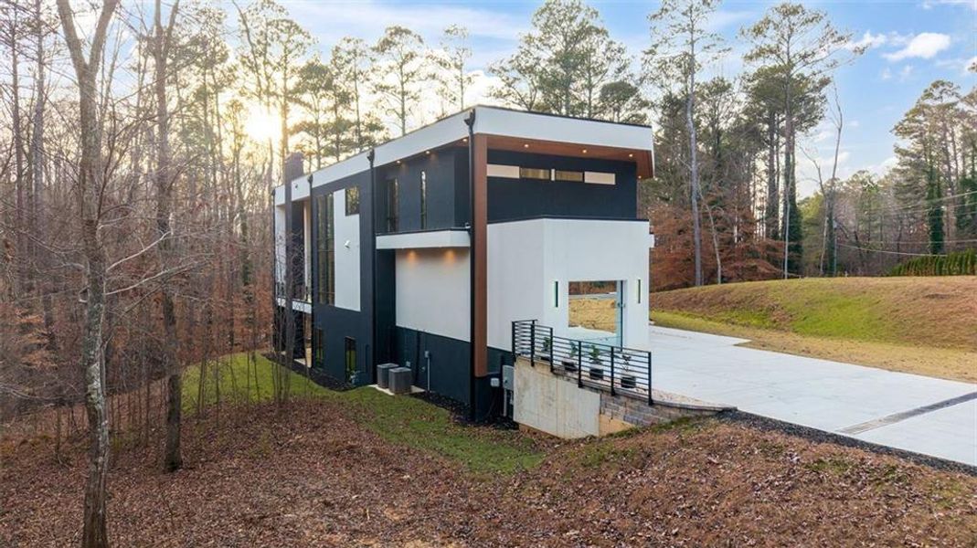 Front exterior of a new home in , Roswell, GA, highlighting curb appeal (Image 1). Front exterior of a new home in , Roswell, GA, highlighting curb appeal (Image 1).