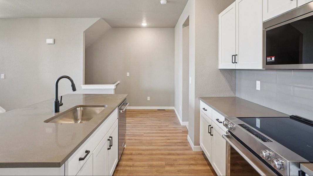 Furnished interior view inside a new home in Windler Townhomes, Aurora (Image 15).