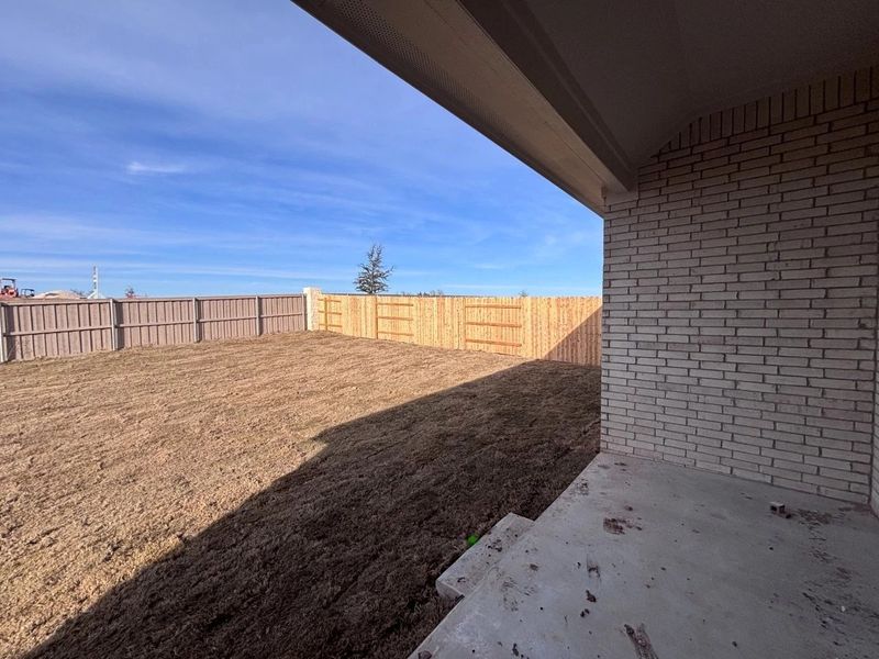 Exterior details and patio area of a home in The Colony, Bastrop (Image 4).